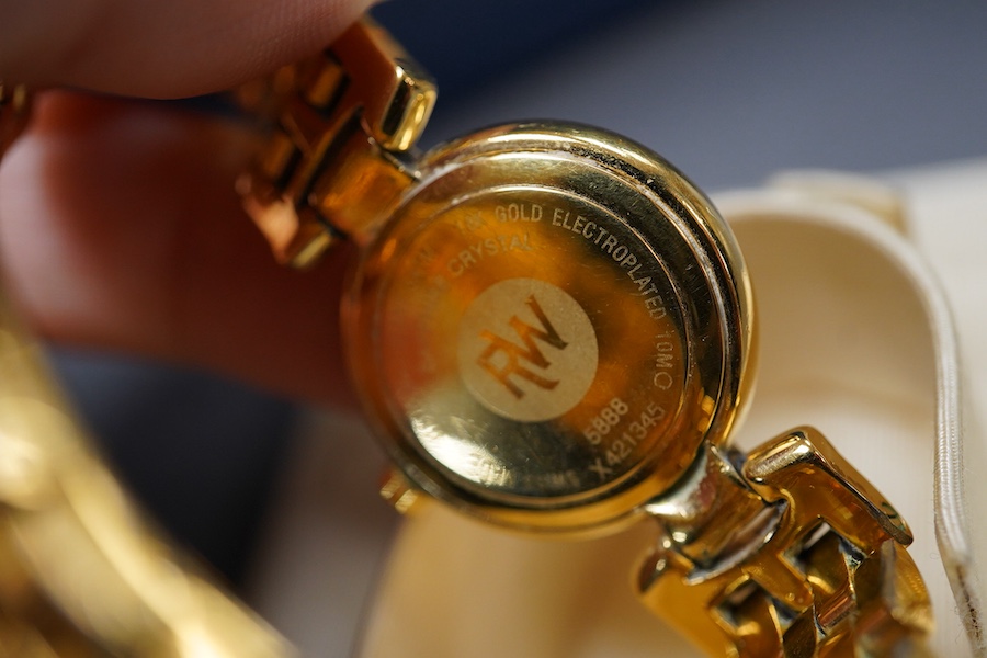 A lady's 2002 gilt steel Raymond Weil quartz wrist watch, with mother of pearl dial and simulated diamond dot numerals, with box and papers.